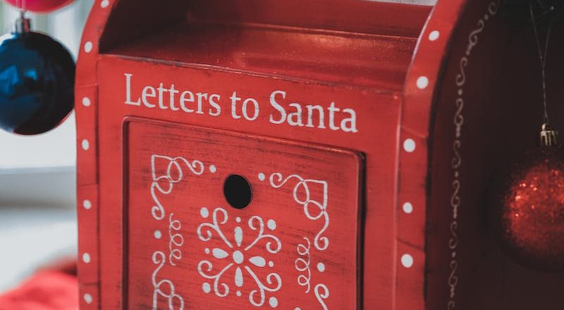Christmas decorated mailbox under tree